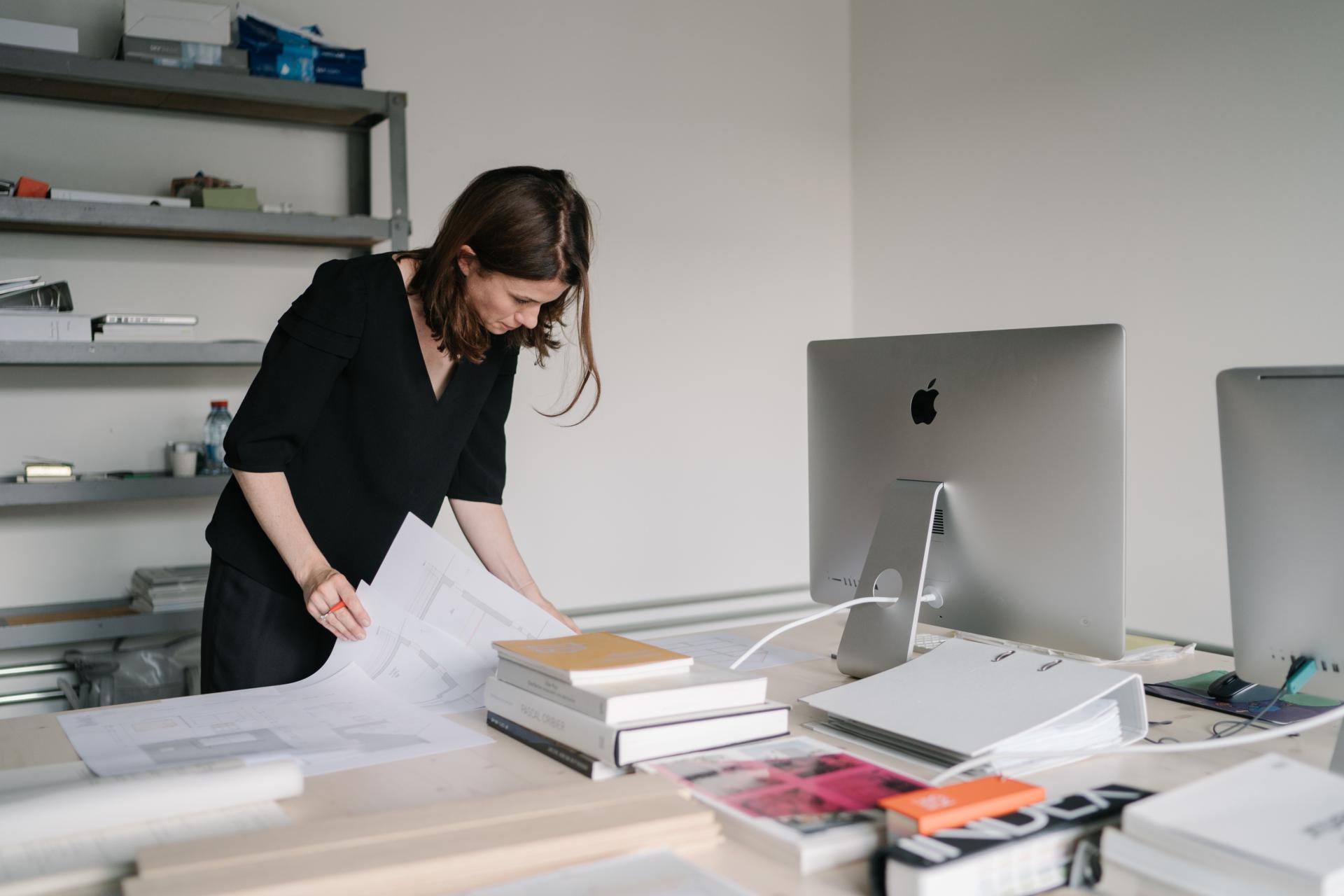 Anouck Pesch working in her office